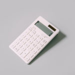 white calculator on gray background
