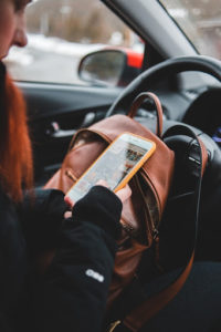 woman on cellphone in a car